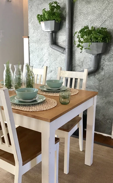Silver Grey slate veneer feature wall beside dining table
