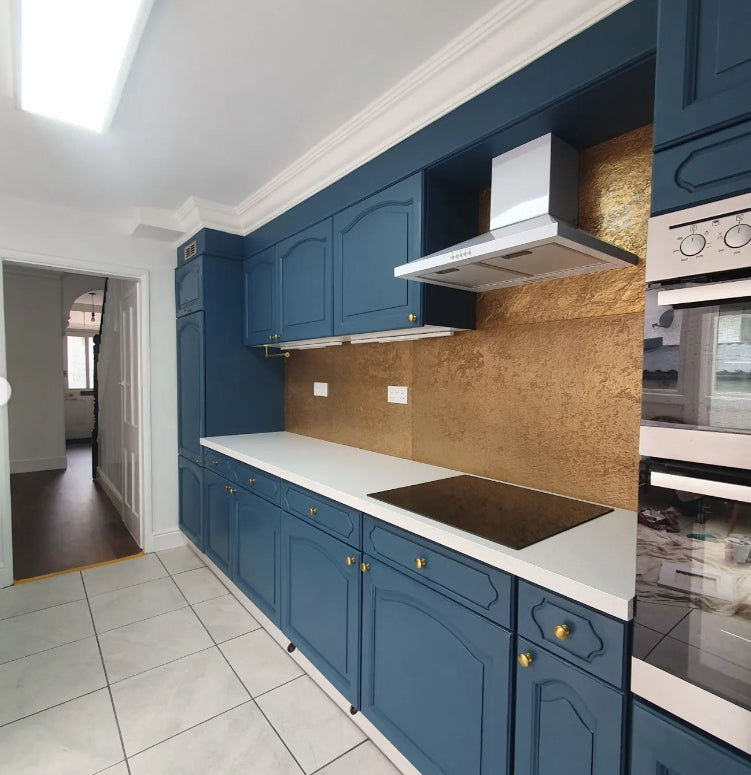 gold metal veneer kitchen walls