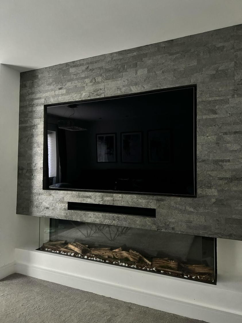 Silver grey slate veneer multi brick media wall with fireplace