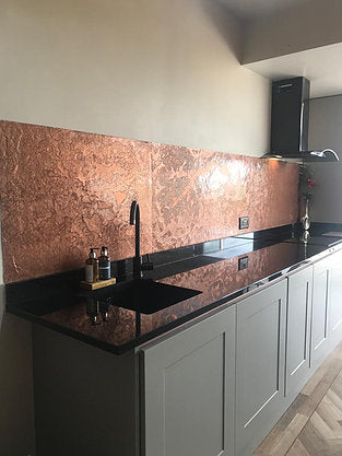 Copper metal veneer kitchen walls
