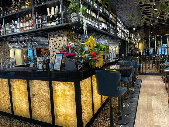 Falling Leaves translucent slate veneer bar front covering