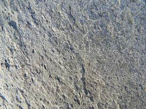 Silver grey slate veneer close up 