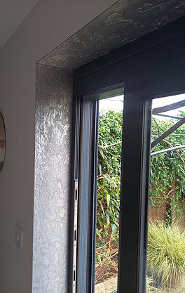Silver metal veneer window lining 
