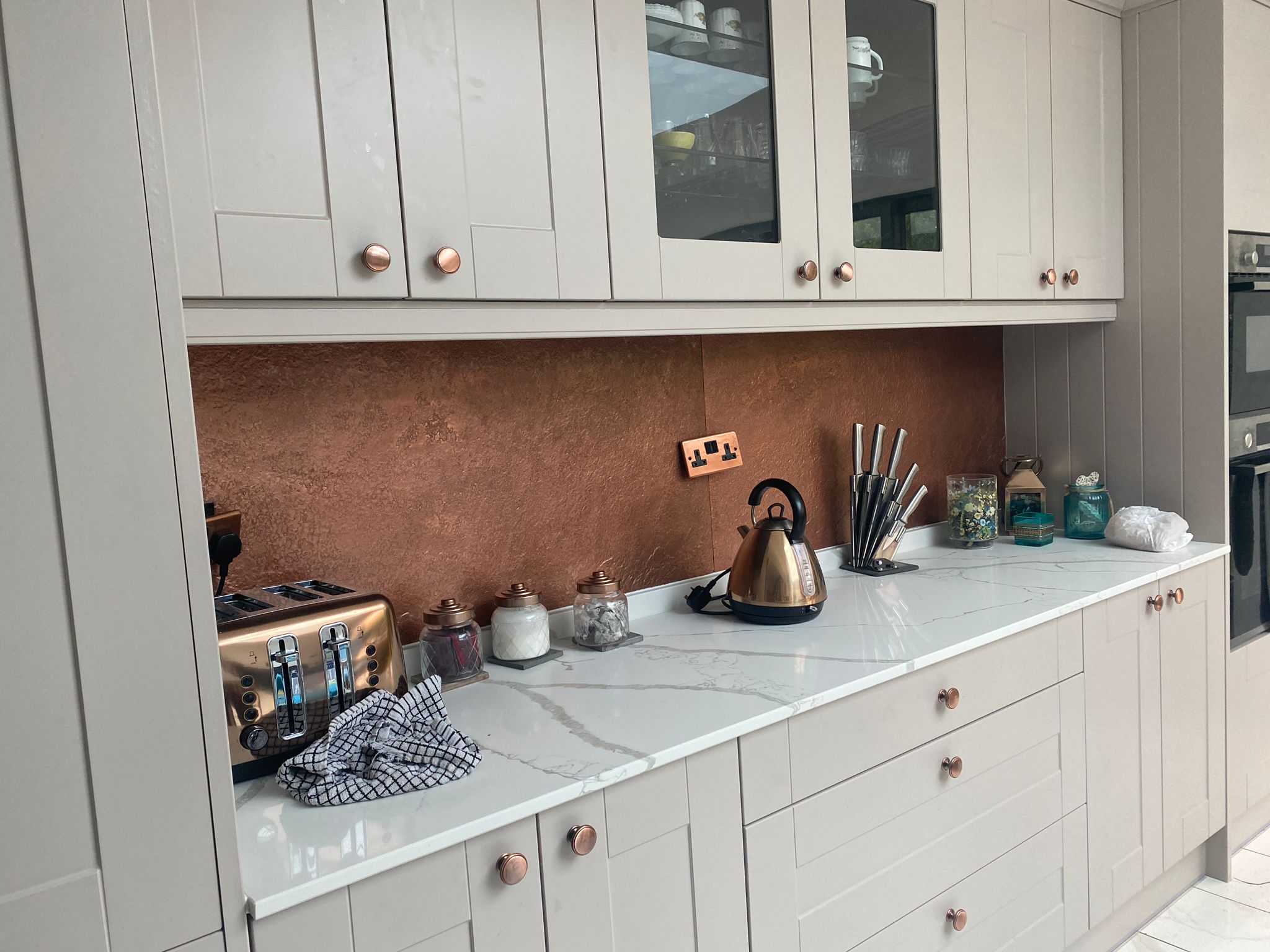 Copper metal veneer kitchen walls