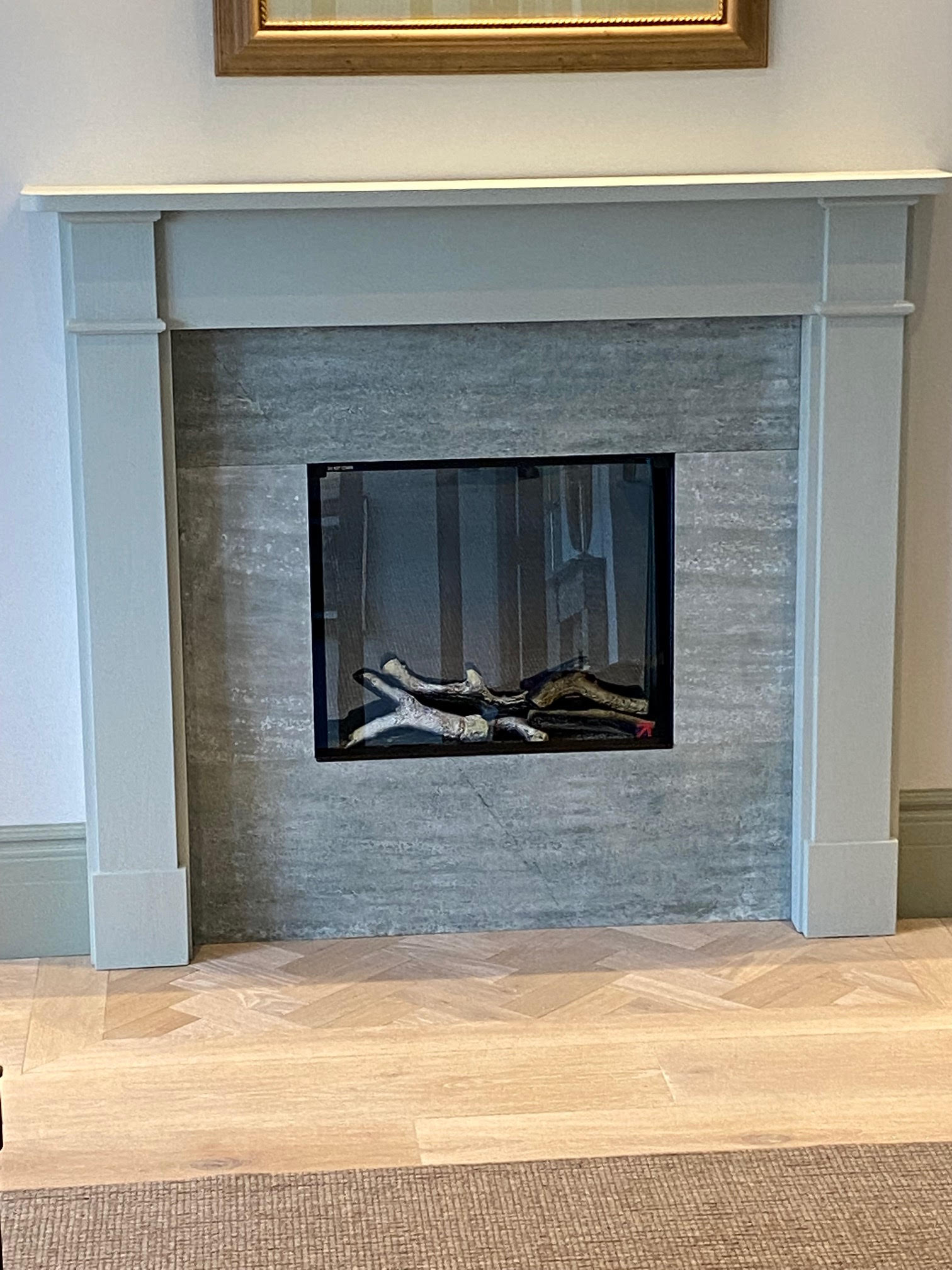 Green Pearl limestone veneer fireplace