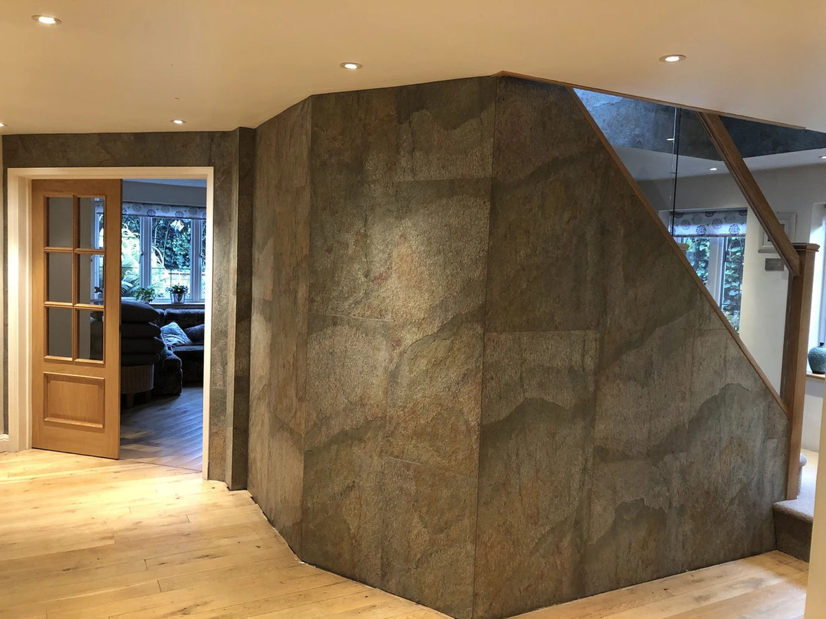 Argento Auro slate veneer cladding around contemporary staircase