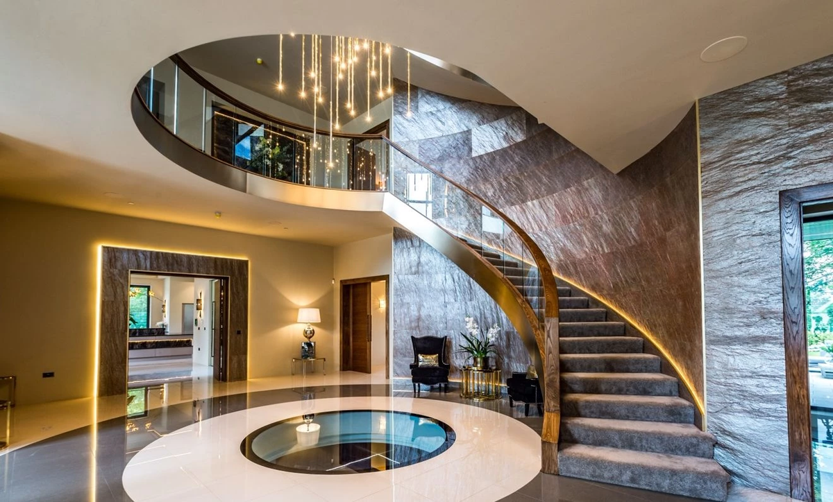 Cobre slate veneer feature wall around curved staircase