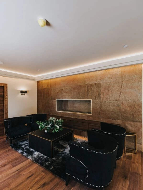 Cobre slate veneer living room feature wall with fireplace