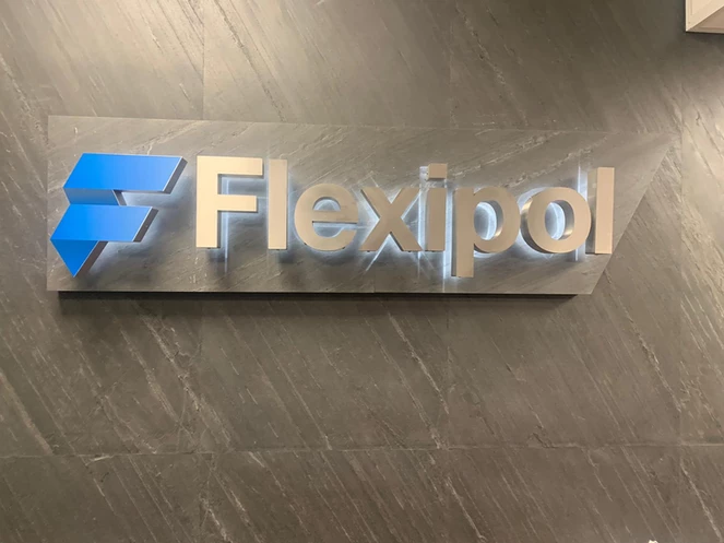 D Black slate veneer wall with illuminated corporate signage