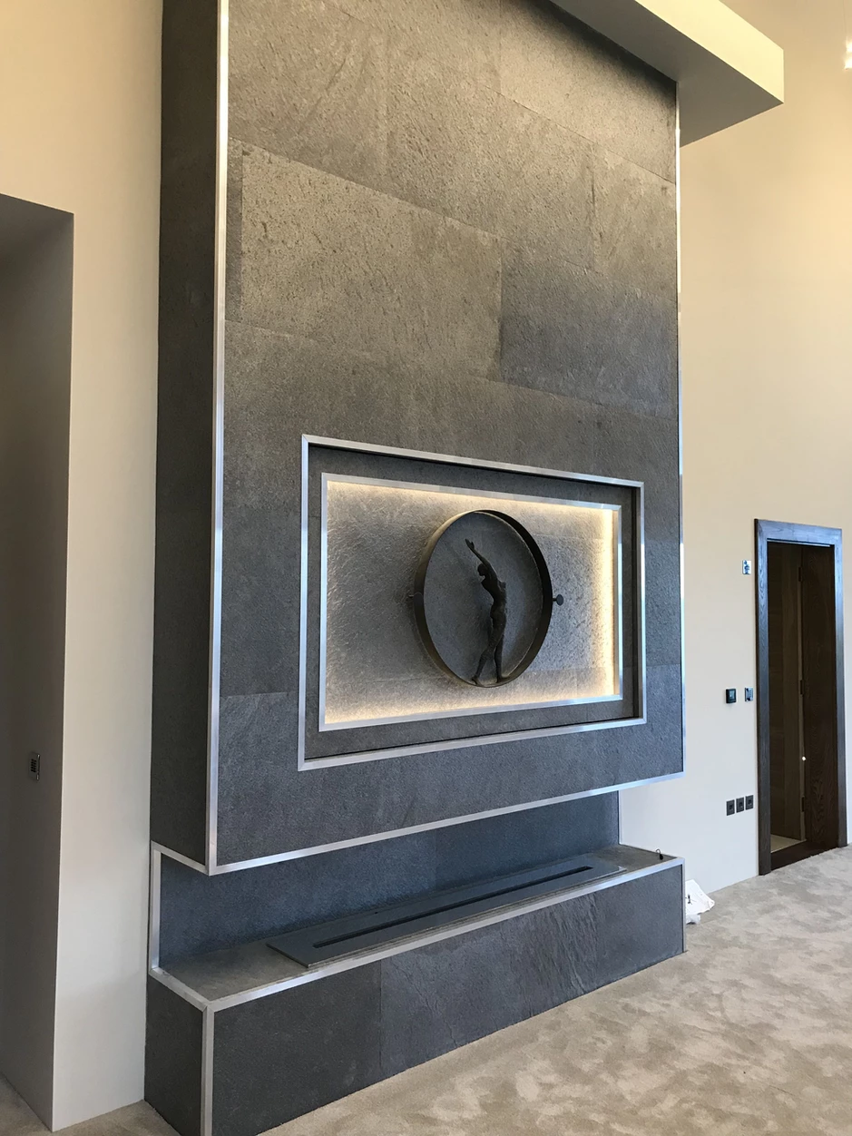 Galaxy Black slate veneer feature wall with illuminated artwork