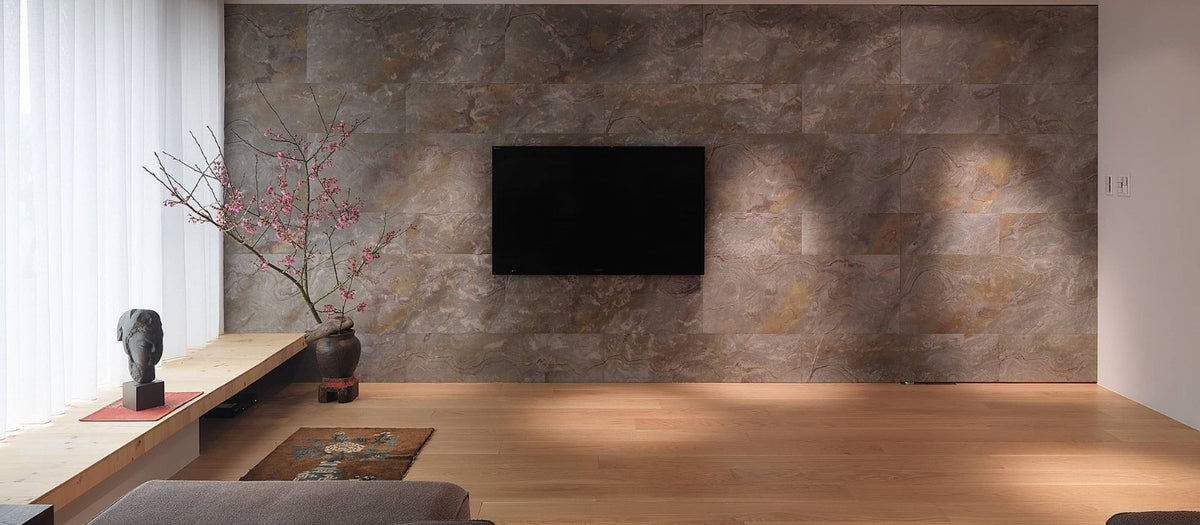 Natural stone veneer feature wall in a modern living room.