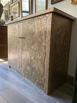 Gold metal veneer cabinet covering