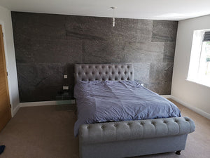Black Pearl stone veneer bedroom feature wall
