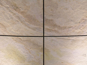 Tan slate veneer feature wall close up 